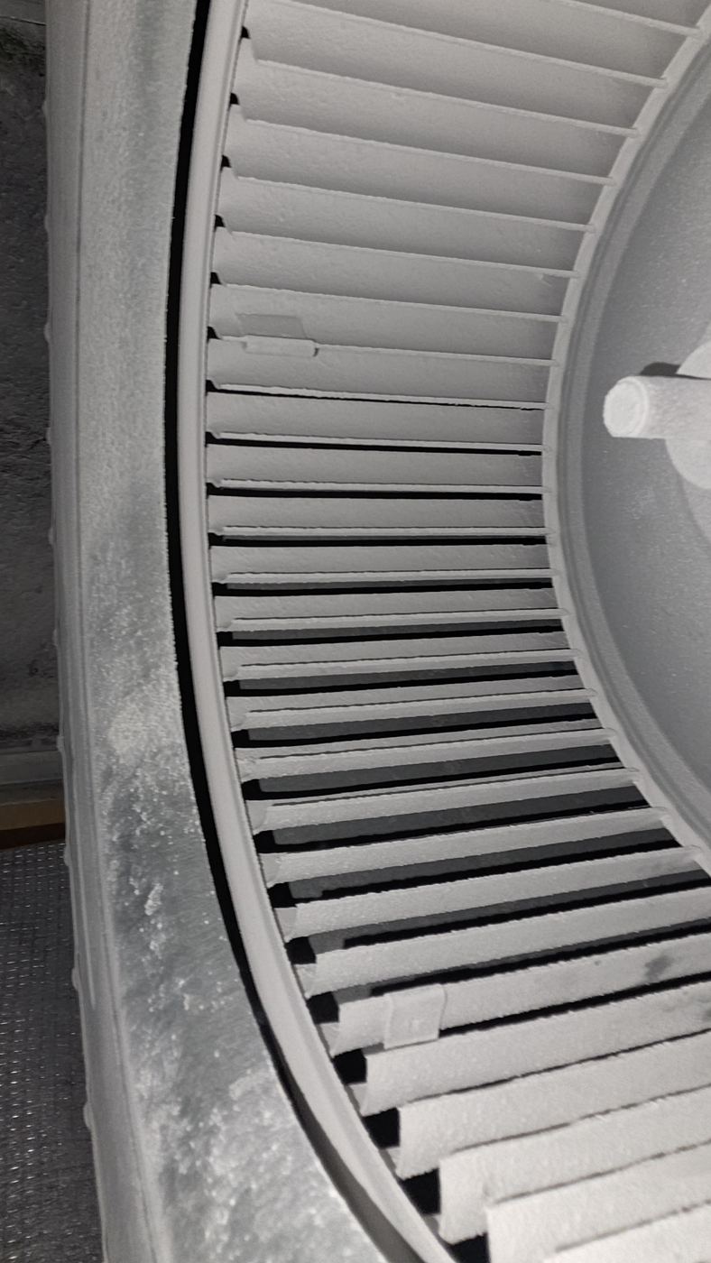 Furnace blower wheel caked in dust before cleaning