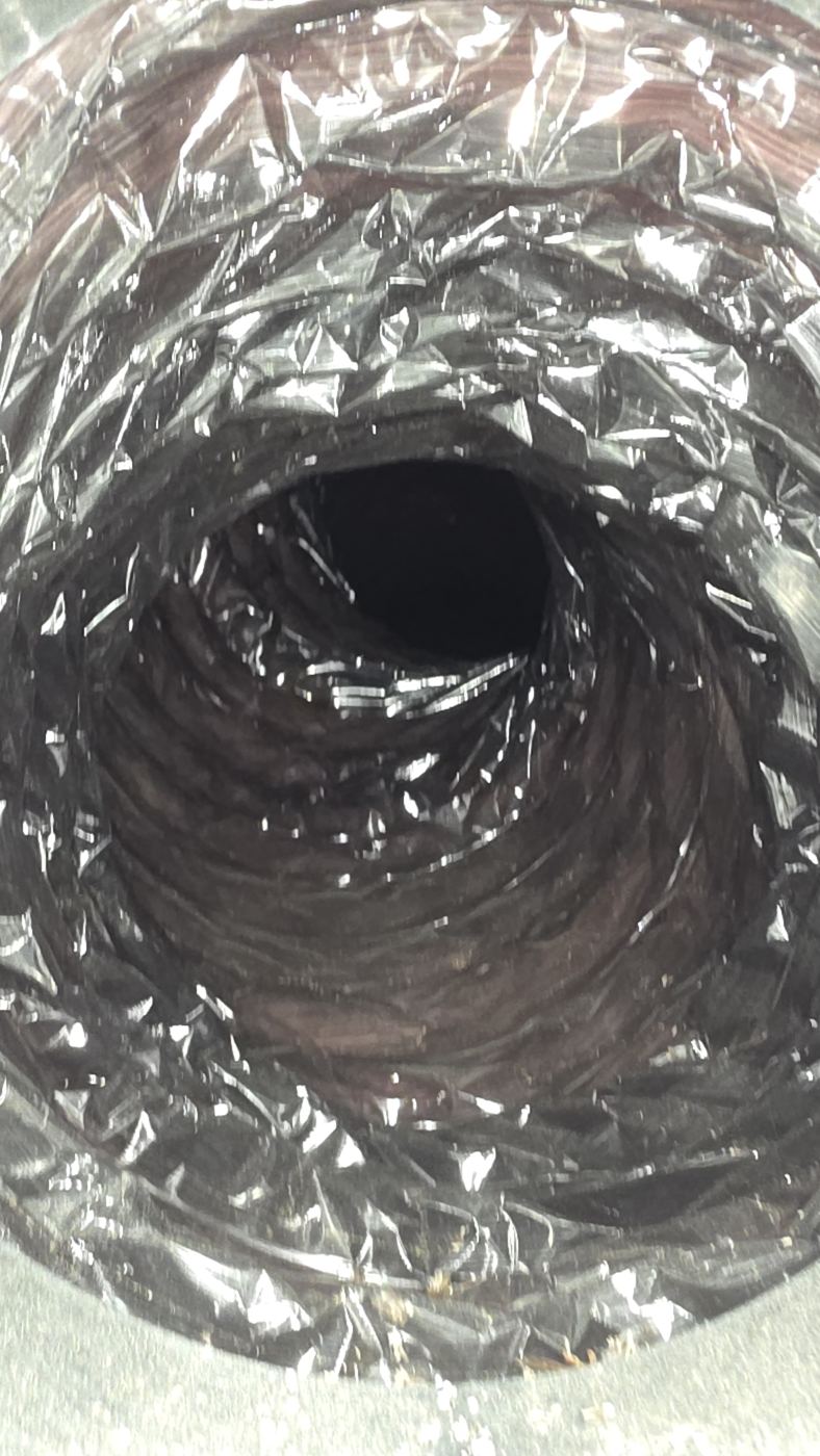 Clear dryer vent duct interior after professional cleaning