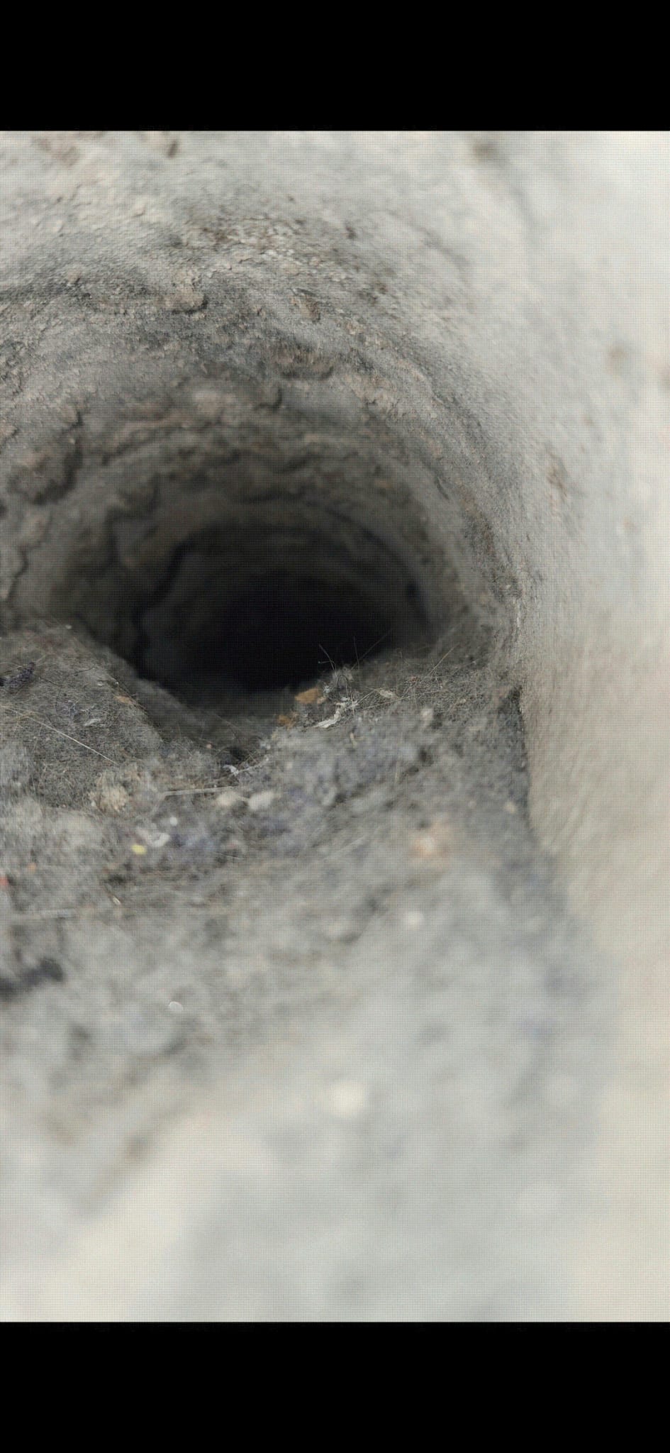 Dryer vent line almost completely blocked with compacted lint